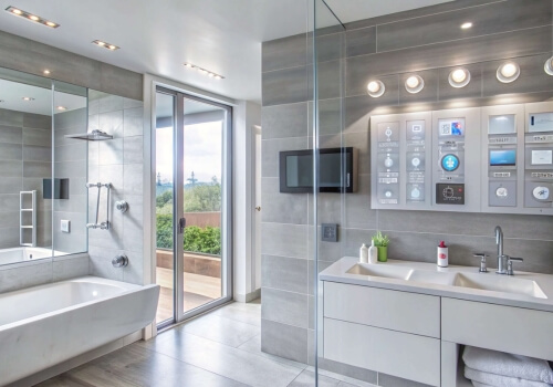 A modern bathroom with a slim freestanding storage tower.